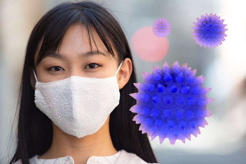 ウイルス・菌・PM2.5に囲まれたマスクをした女性